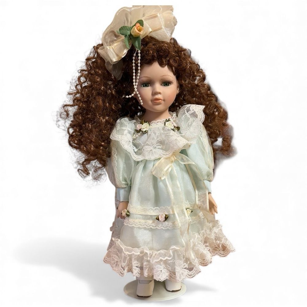 The Emerald Doll Collection Porcelain Auburn Brown Hair Cream and Blue Dress